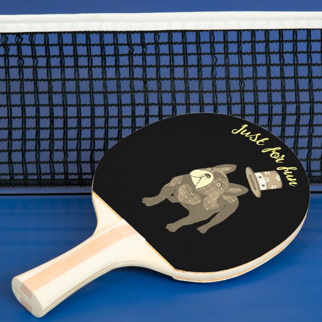 French bulldog with cylinder ping pong paddle (Insitu)