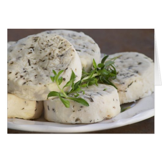 French goat cheese - chevre - with herbs on a (Front Horizontal)