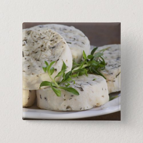 French goat cheese _ chevre _ with herbs on a button