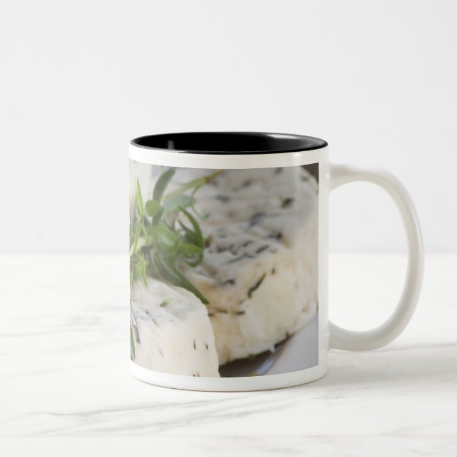 French goat cheese - chevre - with herbs on a Two-Tone coffee mug (Right)