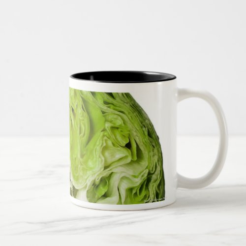 Fresh iceberg lettuce cut in half on white Two_Tone coffee mug
