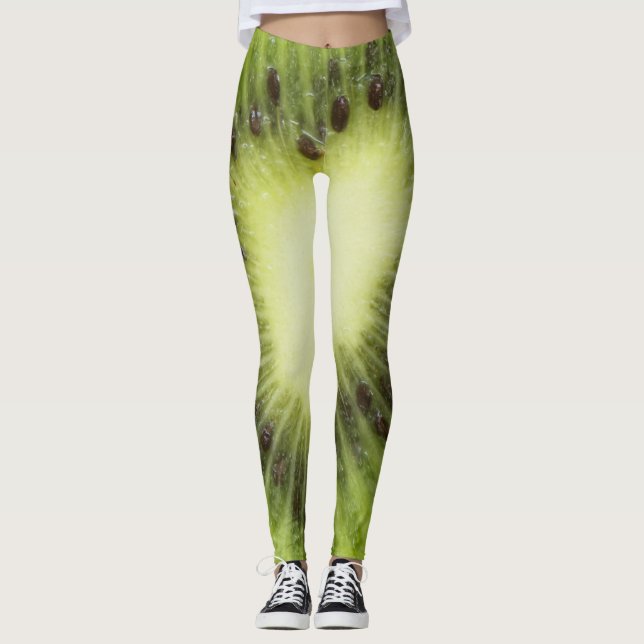 Fresh kiwi fruit. Round slice closeup isolated Leggings (Front)