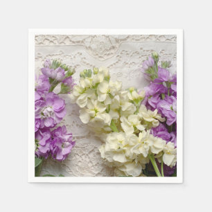 Fresh lilacs on old lace napkins