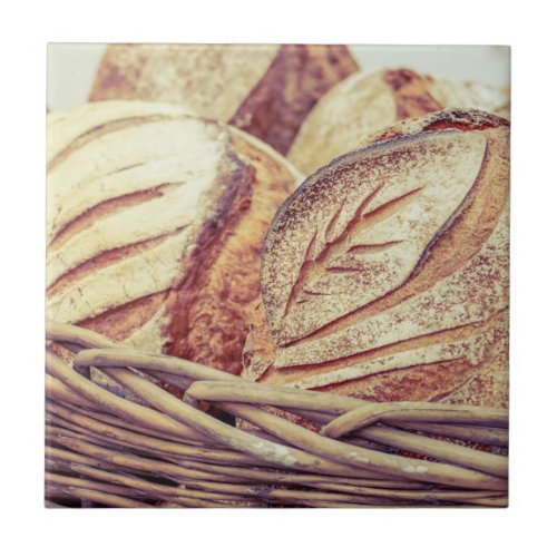 Fresh Loaves of Bread in a Basket Ceramic Tile