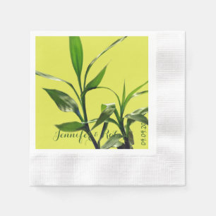 Fresh lucky bamboo green leaves in green paper napkins