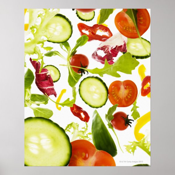Fresh mixed salad vegetables falling to camera poster
