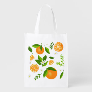 Fresh oranges with flowers and leaves grocery bag