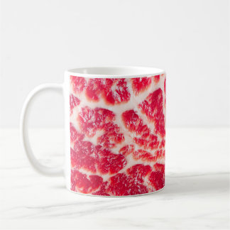 Fresh raw beef steak marbled meat texture close up coffee mug