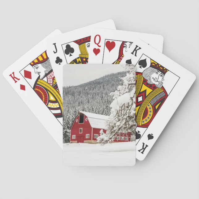Fresh snow on red barn poker cards (Back)