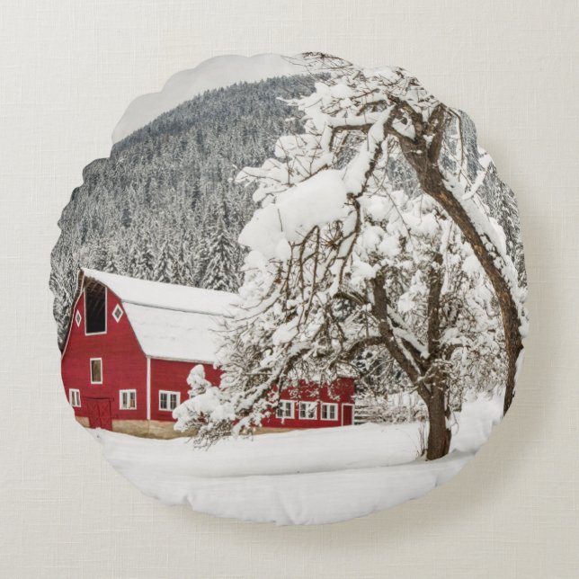 Fresh snow on red barn round pillow (Front)