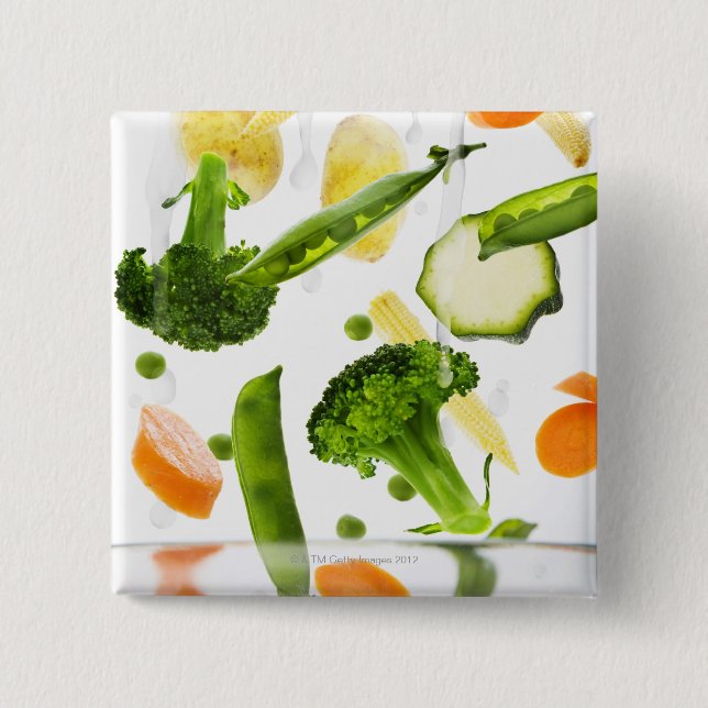 Fresh vegetables with water falling into a bowl pinback button (Front)