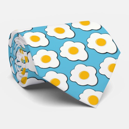 fried eggs for breakfast with blue background neck tie