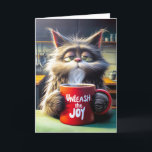 Friend's Birthday Sleepy Cat With Red Mug Card<br><div class="desc">A fluffy cat with sleepy eyes holds a steaming red mug bearing the slogan "Unleash the Joy" in a cozy kitchen setting.
The inside text can be changed.</div>