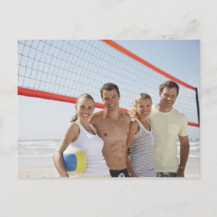 Friends on beach volleyball court postcard