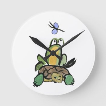Frog Catches A Ride On Turtle Round Clock by Nine_Lives_Studio at Zazzle