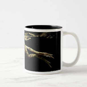 frog swimming in the dark just below the surface Two-Tone coffee mug