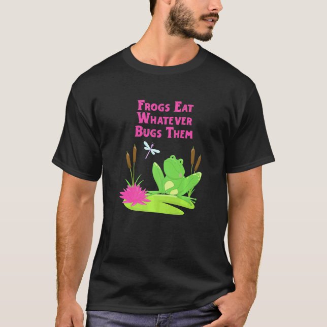 Frogs Eat Whatever Bugs Them Dragonfly Frog Pun T-Shirt (Front)