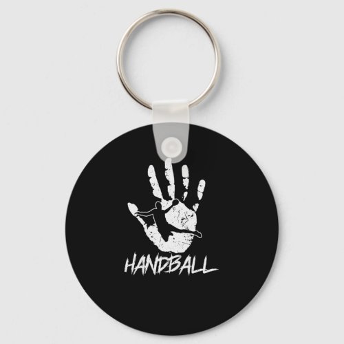 from hand to ball keychain