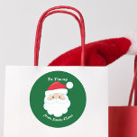 From Santa Cute Custom Green Kids Christmas Gift Classic Round Sticker<br><div class="desc">Customize these cute Santa Claus gift stickers with your own personalized text with your kids name in white script. Santa's red hat and white beard are the perfect holiday drawing on this pretty green gift label for your presents.</div>