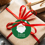 From Santa Cute Custom Green Kids Christmas Gift Favor Tags<br><div class="desc">Customize these cute Santa Claus round gift tags with your own personalized text with your kids name in white script. Santa's red hat and white beard are the perfect holiday drawing on this pretty green gift tag for your presents.</div>