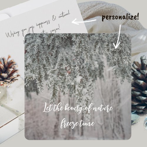 Frosted branches and a snow_covered forest holiday card