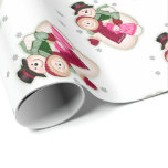 Frosty Snowman Family - Pink Wrapping Paper<br><div class="desc">Frosty the Snowman with Mrs Frosty and child. They are all dressed up in scarf and mittens with sprinkle of snowflakes around them. Great design for the holidays or throughout winter.</div>