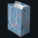 Frosty the Snowman Blue Snowflake Pattern Medium Gift Bag<br><div class="desc">Chill out with Frosty the Snowman in this fun winter holiday pattern,  featuring Frosty waving amongst falling snow and his candy cane logo! This pattern is great on gift wrap,  cozy fleece blankets,  and party supplies. Shop this design on many more custom Zazzle products!</div>