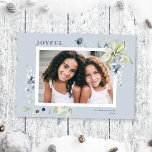 Frosty Winter Watercolor Foliage Berries Photo Holiday Card<br><div class="desc">This elegant and classic holiday photo card features a beautiful watercolor frame of delicate foliage and berries on a lovely dusty blue background. This design accommodates a single horizontal photo on the front. The greeting on the front says "JOYFUL" in a classic serif font, which is completely editable. The back...</div>