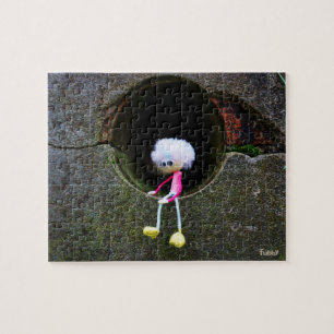 Fubby puppetry sitting in a wall. A cute man Jigsaw Puzzle