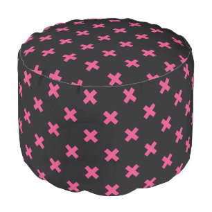 Fuchsia cross stitches on black pouf