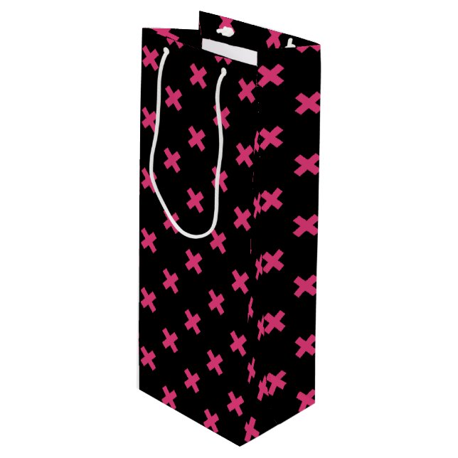 Fuchsia cross stitches on black wine gift bag (Front Angled)