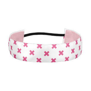 Fuchsia cross stitches on white athletic headband