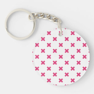 Fuchsia cross stitches on white keychain