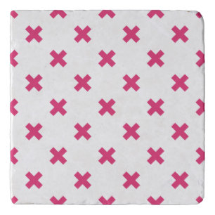 Fuchsia cross stitches on white trivet