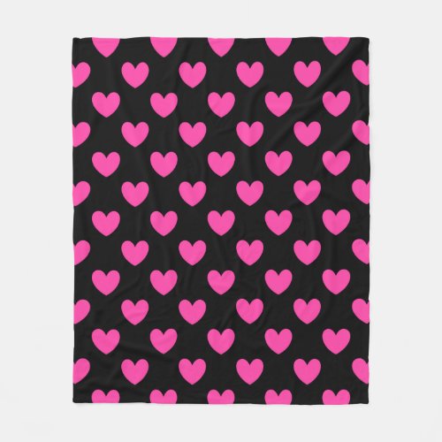 Fuchsia pink polka hearts on black fleece blanket