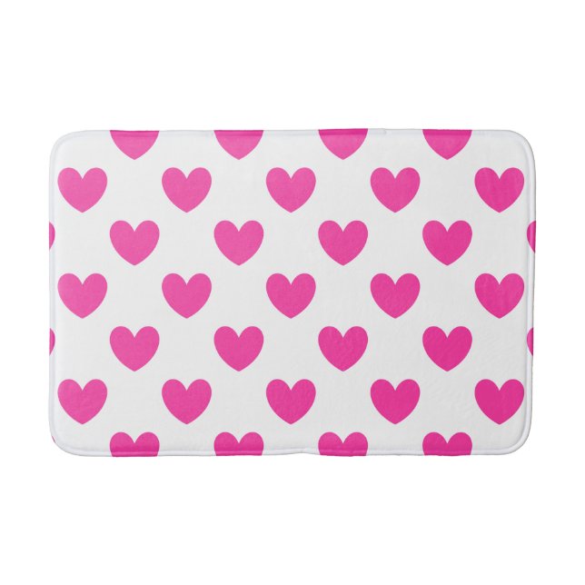 Fuchsia pink polka hearts on white bathroom mat (Front)