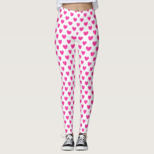 Fuchsia pink polka hearts on white leggings