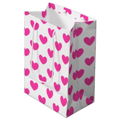 Fuchsia pink polka hearts on white medium gift bag
