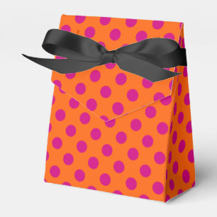 Fuchsia polka dots on orange favor boxes