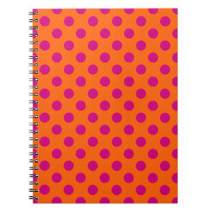 Fuchsia polka dots on orange notebook