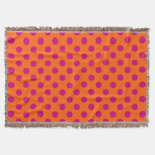 Fuchsia polka dots on orange throw blanket