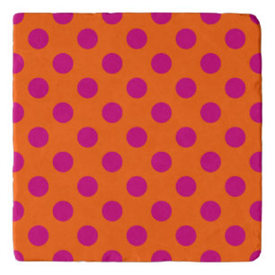Fuchsia polka dots on orange trivet