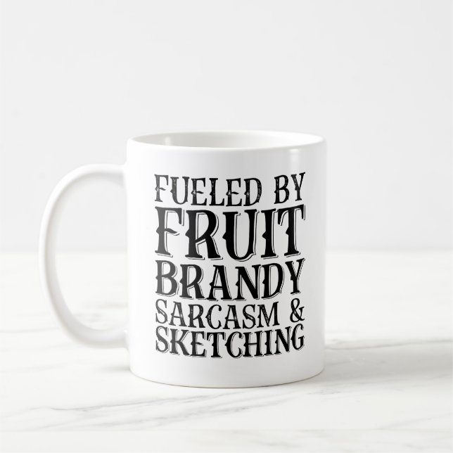 Fueled By Fruit Brandy Sarcasm And Sketching Coffee Mug (Left)