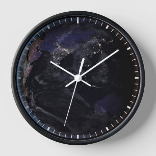 Full Earth Showing City Lights Of Asia At Night. Clock