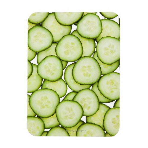 Full frame of sliced cucumber on white magnet