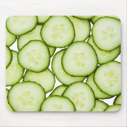 Full frame of sliced cucumber on white mouse pad