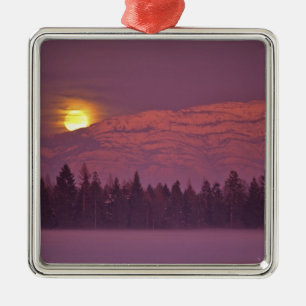 Full moon rises over Teakettle Mountain during Metal Ornament