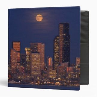 Full moon rising over downtown Seattle skyline Binder