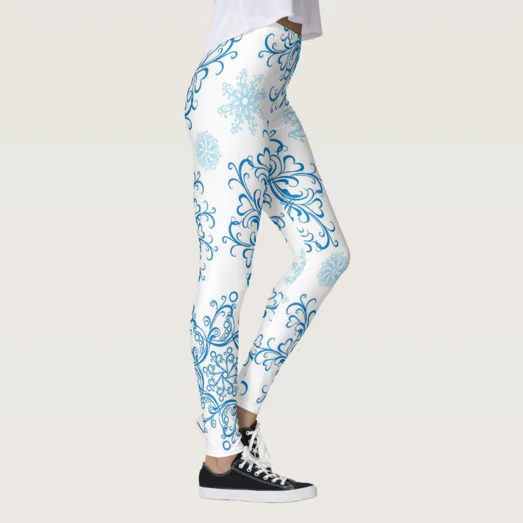 Fun blue white snowflake pattern leggings | Zazzle