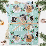 Fun Christmas Joy Snowflake Photo Collage 3 Set Wrapping Paper Sheets<br><div class="desc">'Wishing you joy' fun and stylish wrapping paper set! Three editable templates, each personalized with six photos of your family, friends or pets. You can also include a different name on each sheet. A festive pattern with snowball framed photographs, festive leaves, berries, snow, snowflakes and stars. Custom gift wrap is...</div>